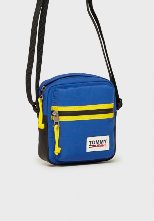 Tommy Jeans malá modro žlutá crossbody TJM COLLEGE TECH REPORTER č.1